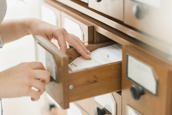 A picture of paper files inside a cabinet